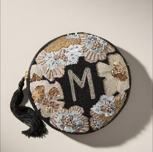Anthropology Black and Gold Round Clutch with Floral Accents
